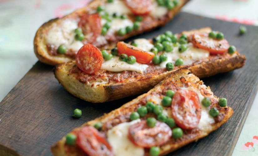 French Bread Pizzas with Peas, Cherry Tomatoes and Mozzarella